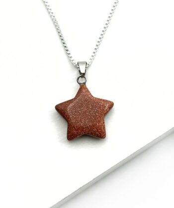 orange og guld krystalstjerne på sølv kæde