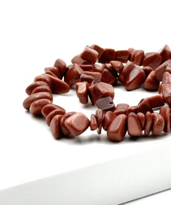 Elastikarmbånd med splitsten i gyldne toner