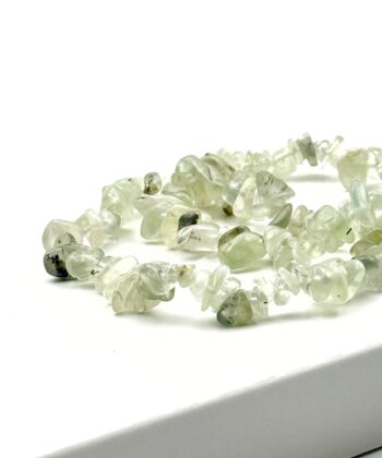 Elastikarmbånd med lysegrønne split sten