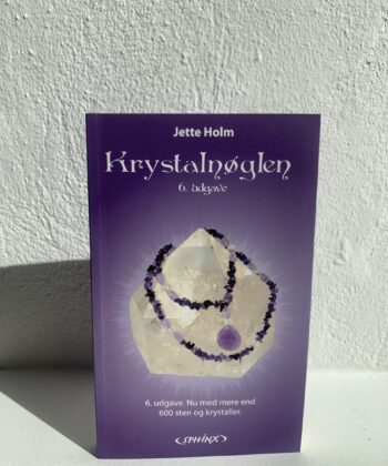 Bogen krystalnøglen på hvid baggrund